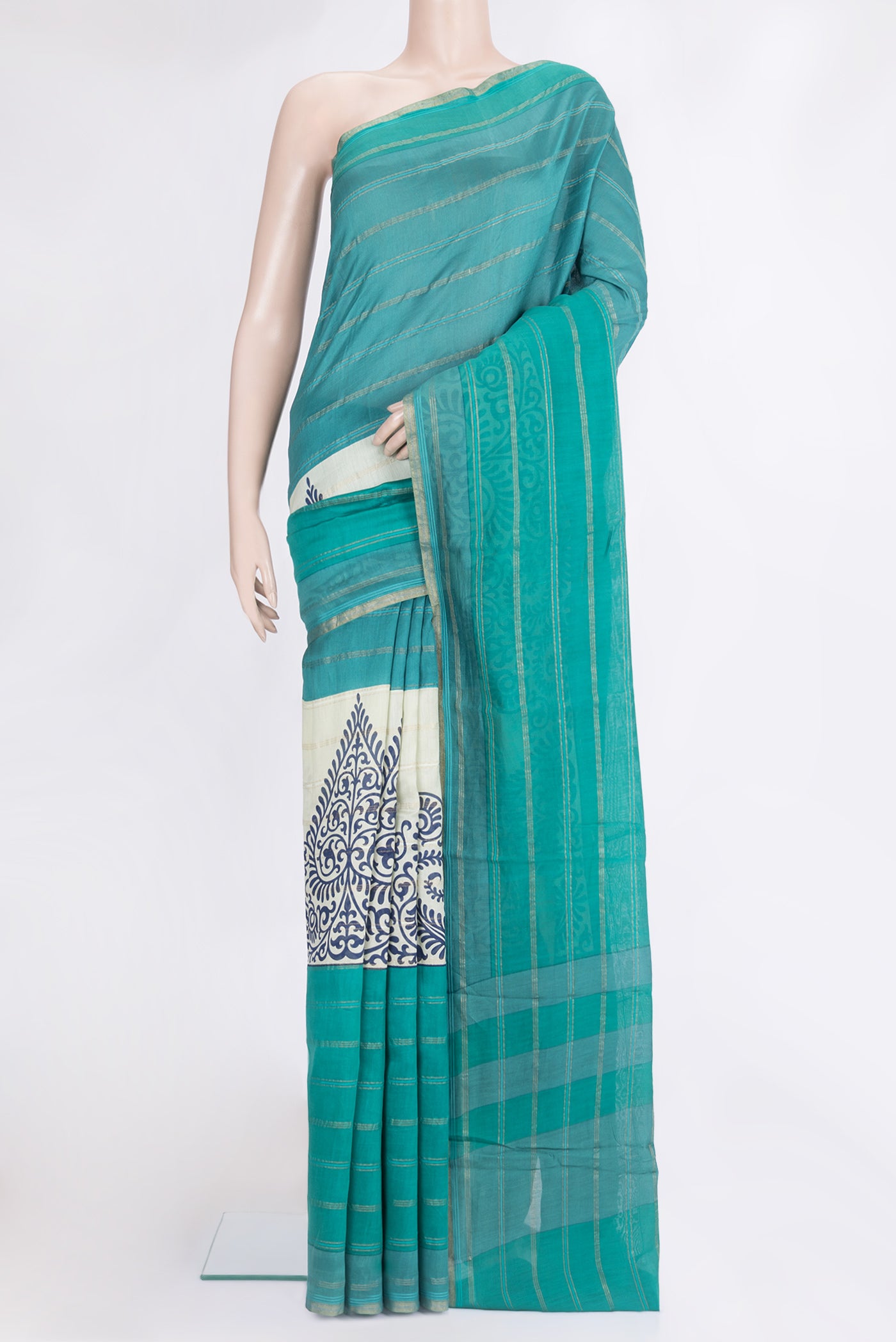 Green Chanderi Silk Cotton Saree with Stripes on the body and Zari Border.  displayed on a mannequin