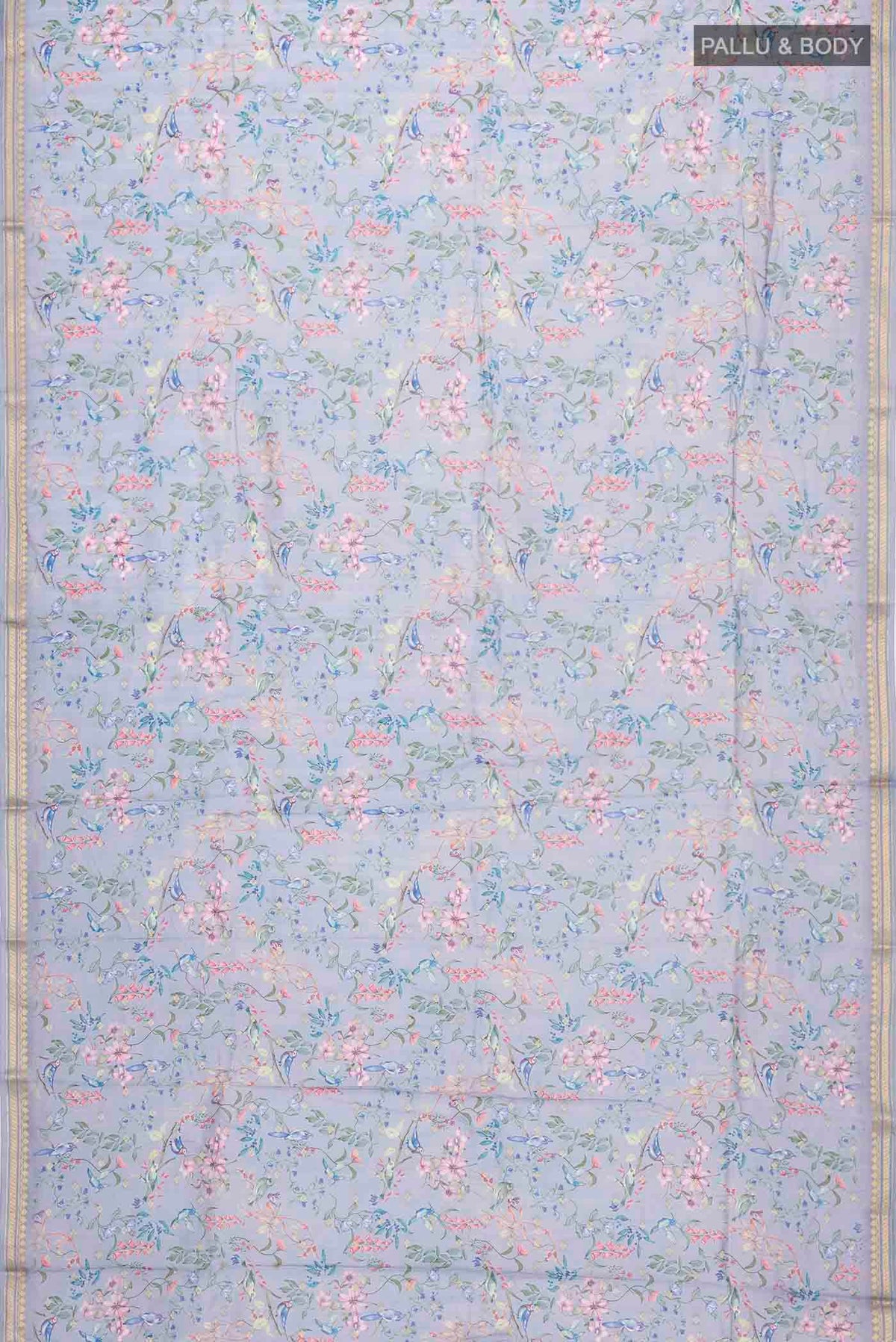 Flat view of Blue Silk Cotton Saree with Printed design on the body and Zari Border
