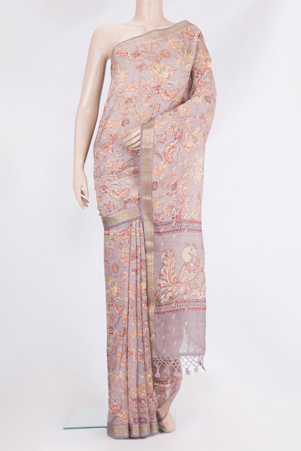 Lilac Chanderi Cotton Saree with Printed design on the body and Zari Border.  displayed on a mannequin