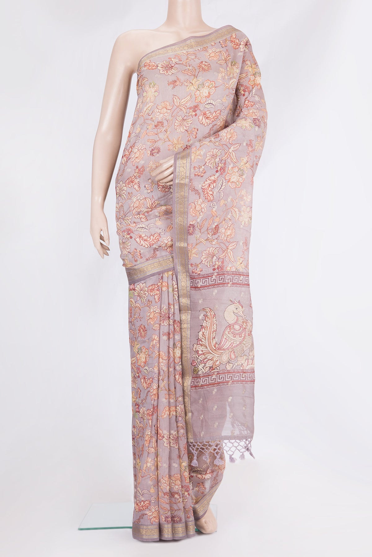 Lilac Chanderi Cotton Saree with Printed design on the body and Zari Border.  displayed on a mannequin
