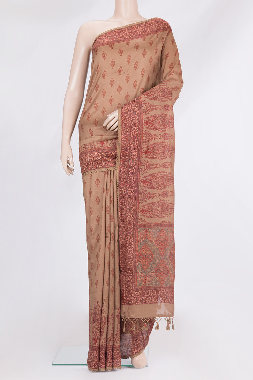Pure Silk Brown Dual Tone Chanderi Saree with Printed design on the body and Thread Border.  displayed on a mannequin