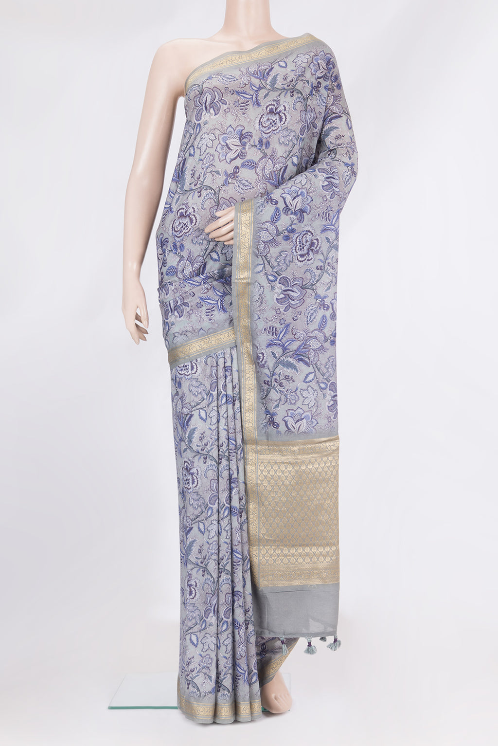 Pure Silk Grey Dual Tone Chanderi Saree with Printed design on the body and Zari Border.  displayed on a mannequin