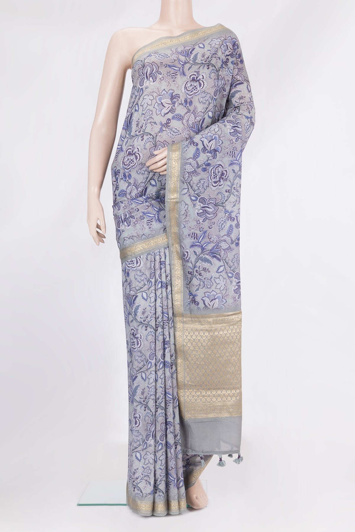 Pure Silk Grey Dual Tone Chanderi Saree with Printed design on the body and Zari Border.  displayed on a mannequin