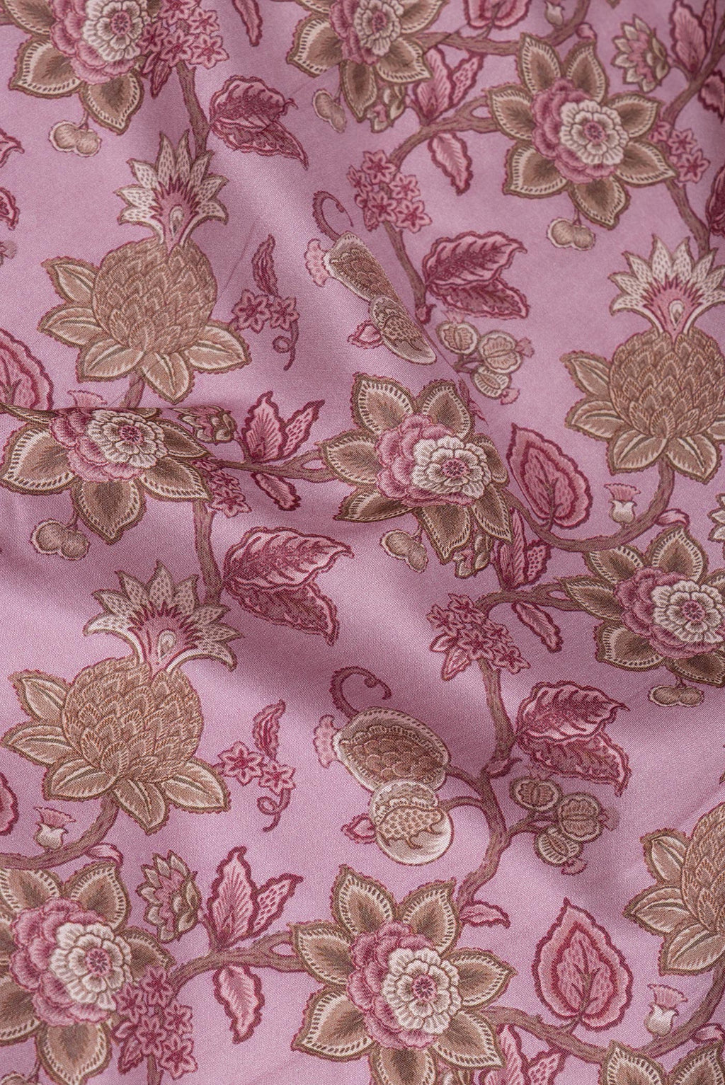 Close up of Pink Dual Tone Chanderi Silk Cotton Saree with Printed design on the body and Zari Border.  displaying folds