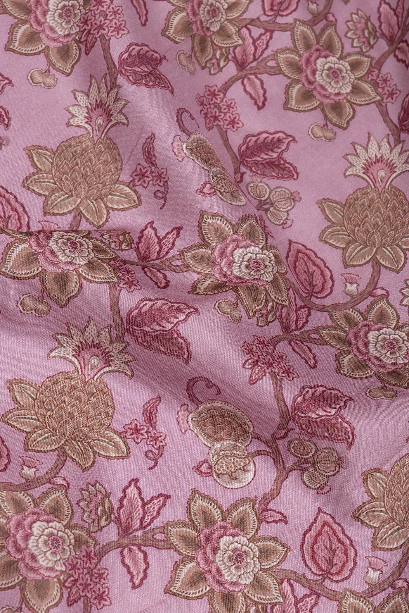 Close up of Pink Dual Tone Chanderi Silk Cotton Saree with Printed design on the body and Zari Border.  displaying folds