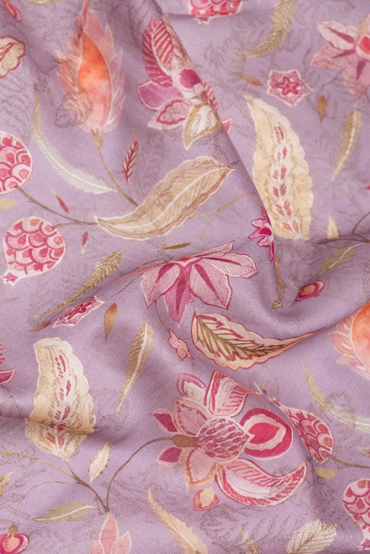 Close up of Lavender Chanderi Silk Cotton Saree with Printed design on the body and Zari Border.  displaying folds