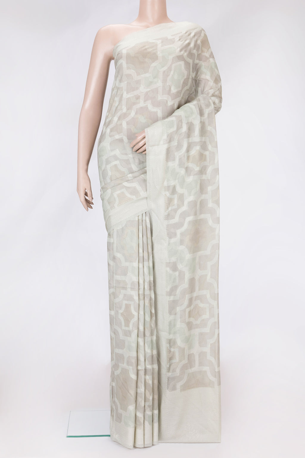 Grey Dual Tone Chanderi Silk Saree with Thread Butta on the body and Zari And Thread Border.  displayed on a mannequin