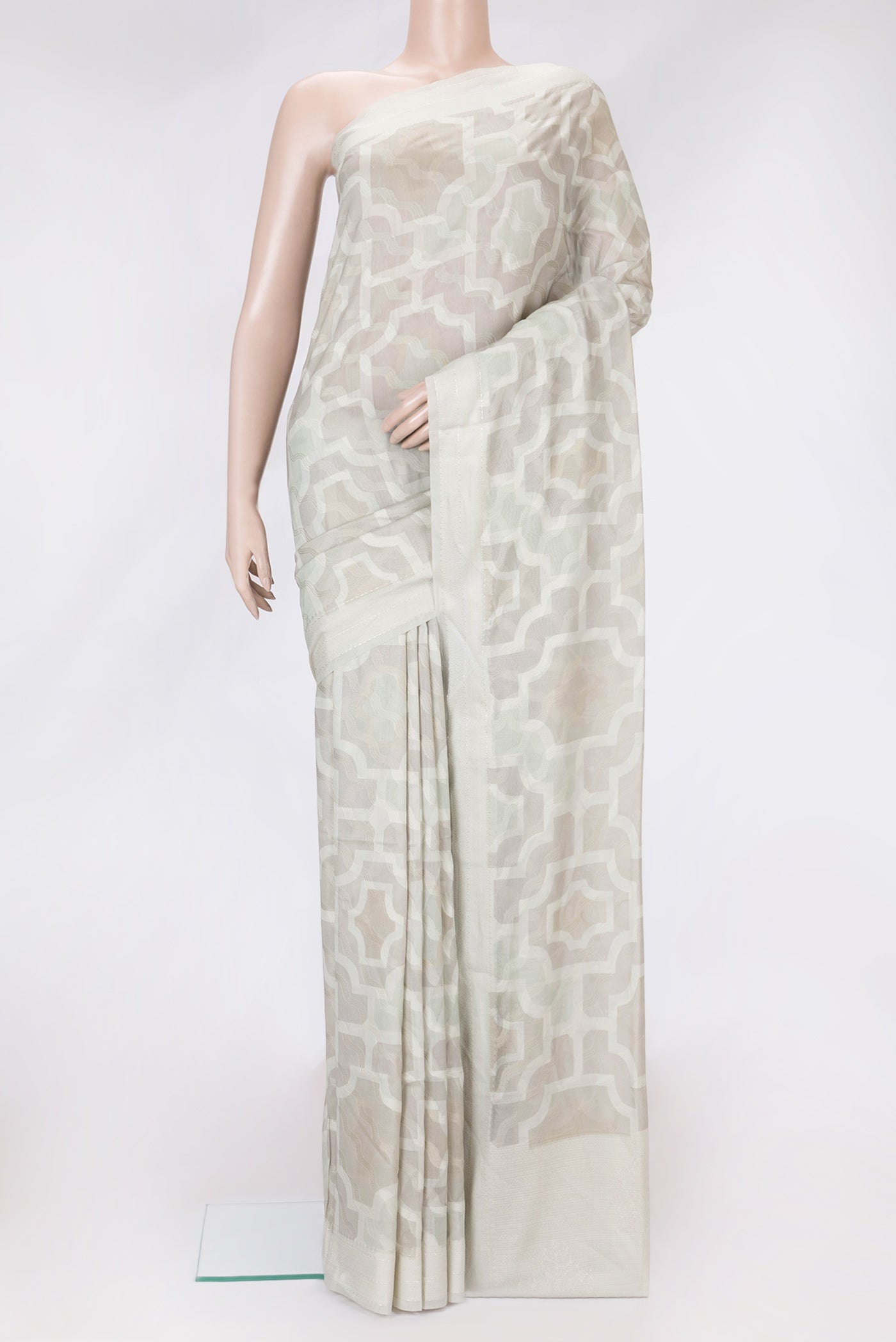 Grey Dual Tone Chanderi Silk Saree with Thread Butta on the body and Zari And Thread Border.  displayed on a mannequin