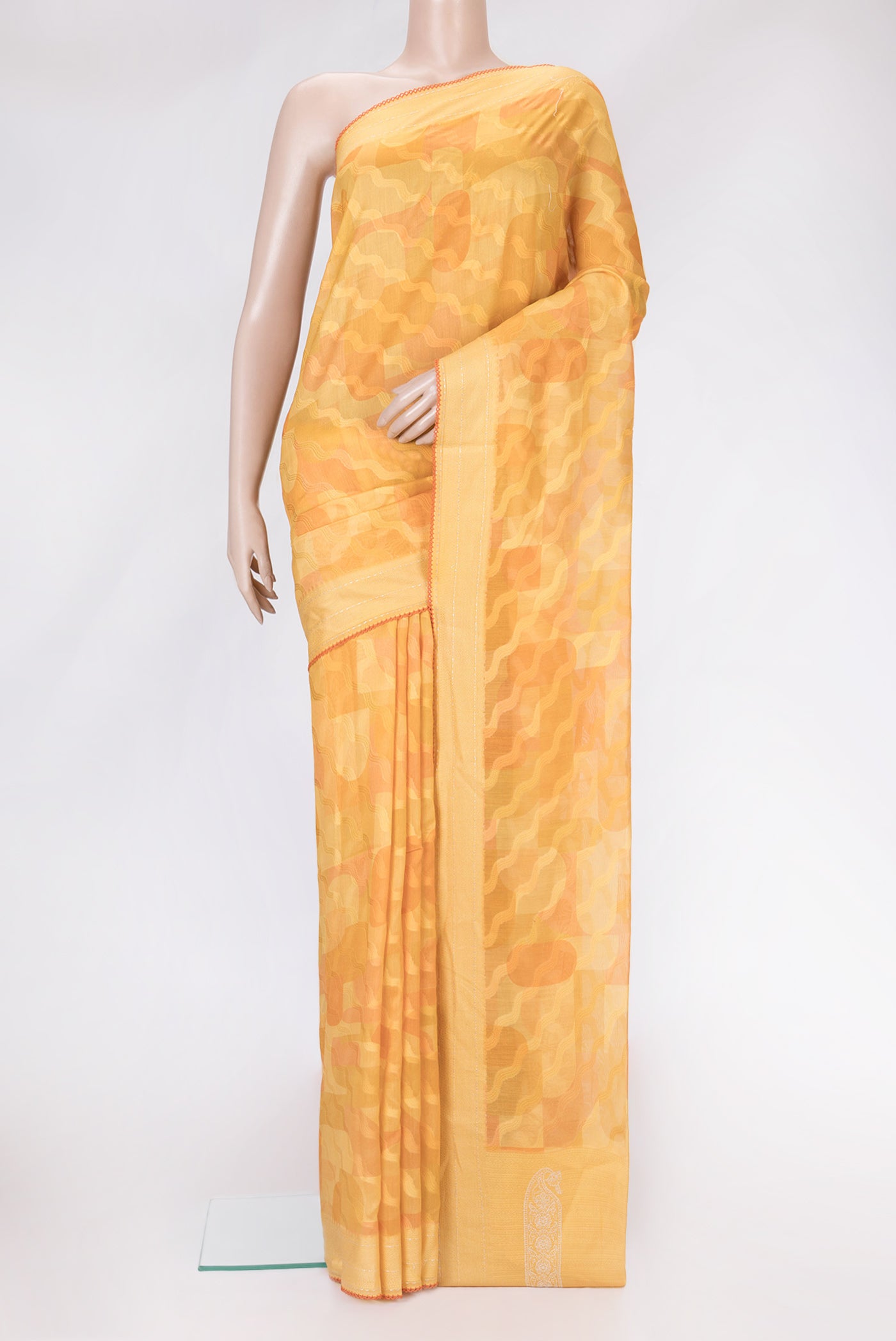 Orange Dual Tone Chanderi Silk Saree with Thread Butta on the body and Zari And Thread Border.  displayed on a mannequin