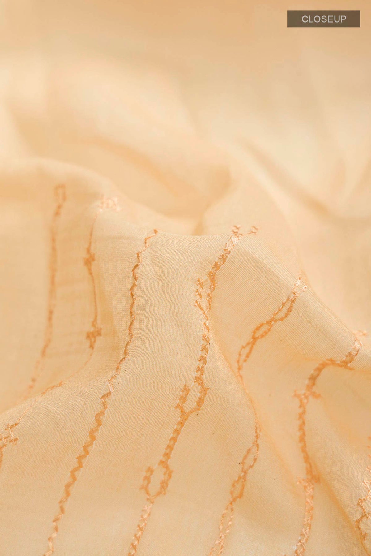 Close up of Yellow Linen Cotton Saree with Stripes on the body and Thread Border displaying folds