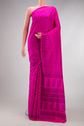 Dark Pink Dual Tone Printed Silk Saree with Printed design on the body and Printed Border.  displayed on a mannequin