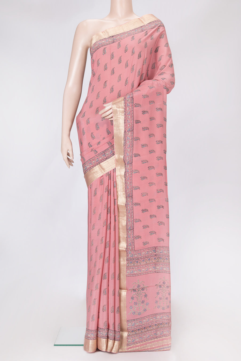 Pink Dual Tone Crepe Saree with Printed design on the body and Zari Border.  displayed on a mannequin