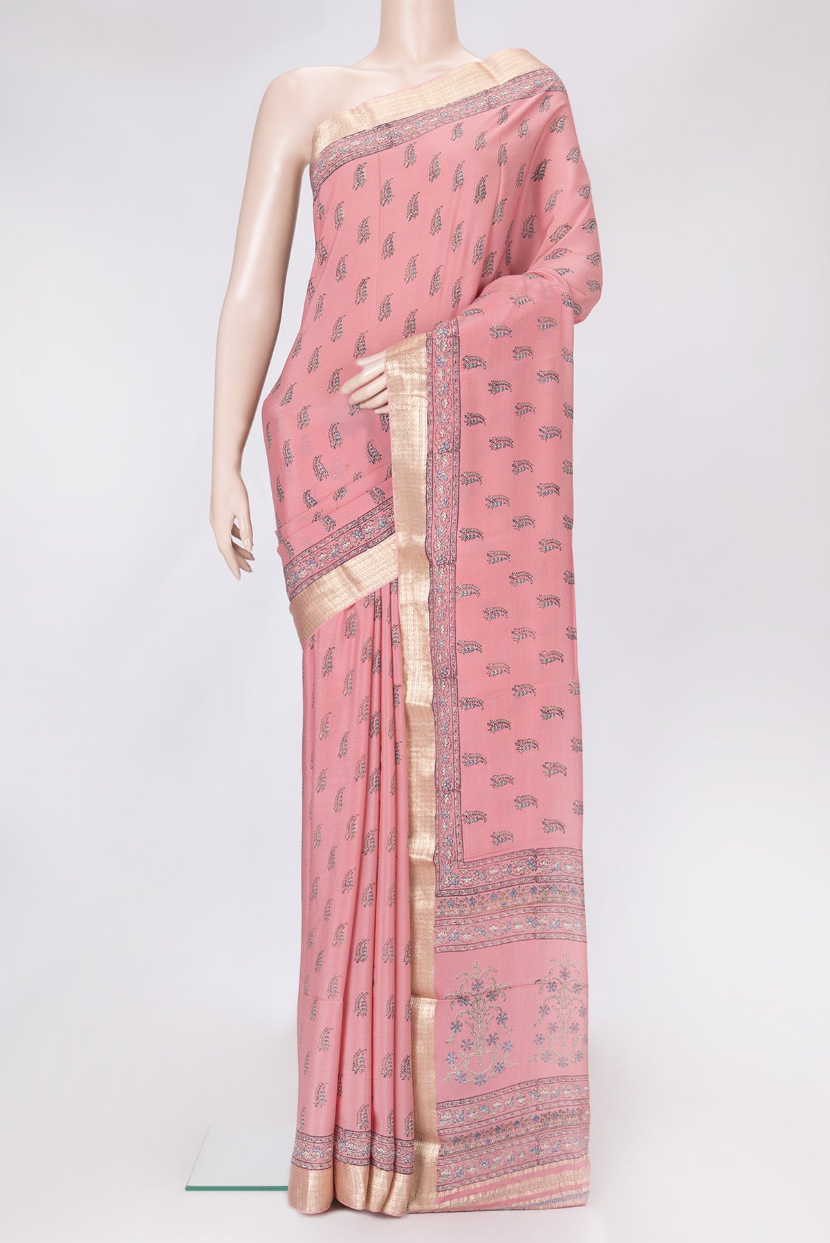 Pink Dual Tone Crepe Saree with Printed design on the body and Zari Border.  displayed on a mannequin
