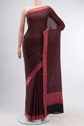 Black Mysore Crepe Saree with Printed design on the body and Thread Border displayed on a mannequin