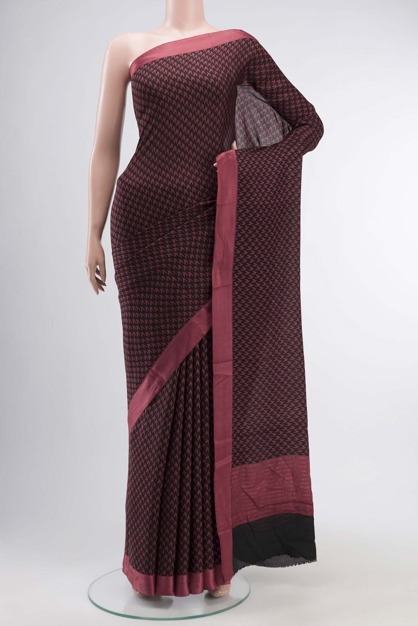 Black Mysore Crepe Saree with Printed design on the body and Thread Border displayed on a mannequin