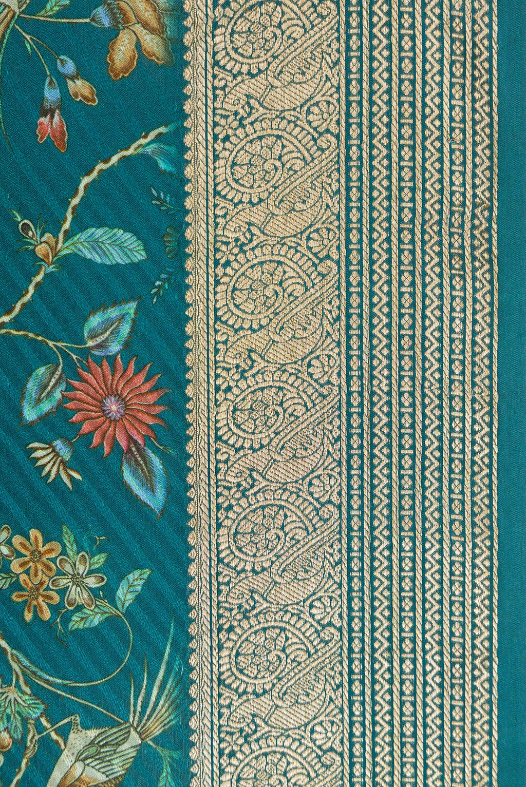 Border image of Peacock Blue Dual Tone Mysore Crepe Saree with Printed design on the body and Zari Border. 