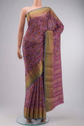Mauve Mysore Crepe Saree with Printed design on the body and Zari Border displayed on a mannequin