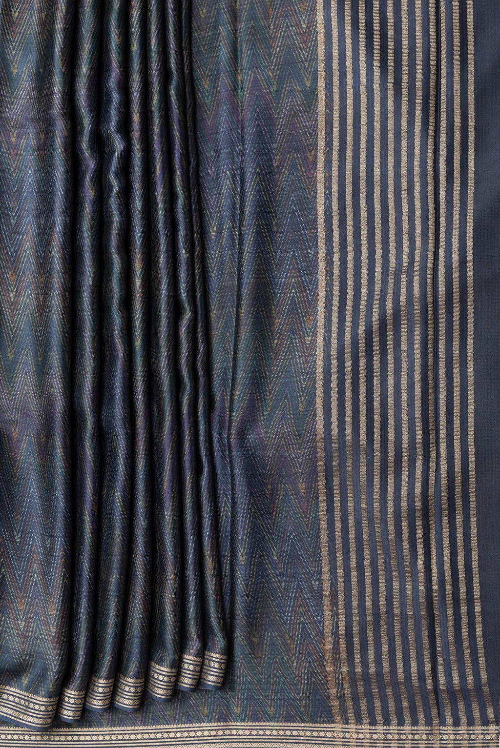 Pleats and pallu of Navy Blue Dual Tone Crepe Saree with Printed design on the body and Zari Border. 