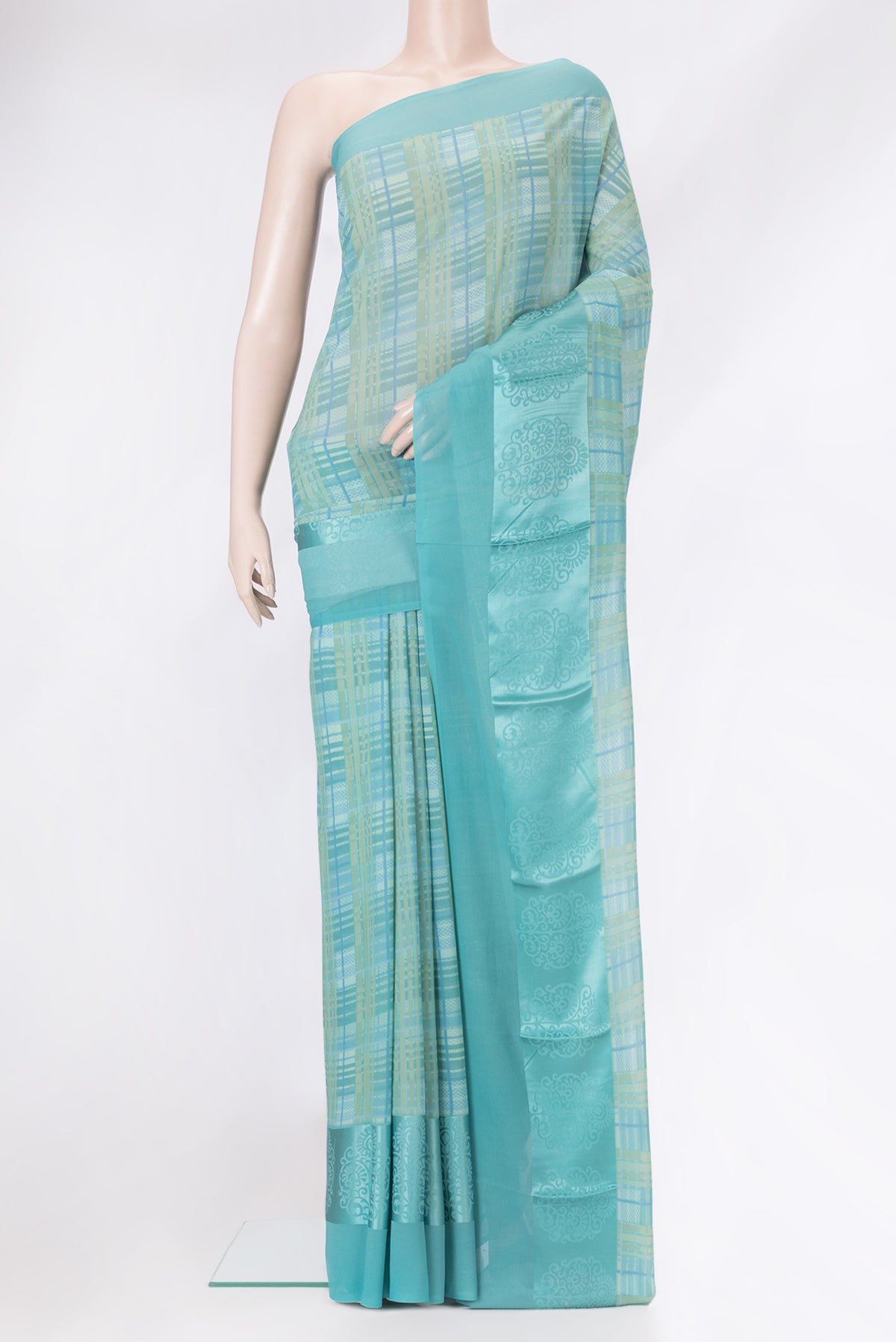 Mehandi Green Dual Tone Mysore Georgette Saree with Printed design on the body and Printed Border.  displayed on a mannequin