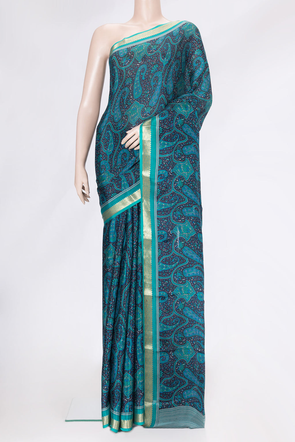 Navy Blue Dual Tone Crepe Saree with Printed design on the body and Zari Border.  displayed on a mannequin