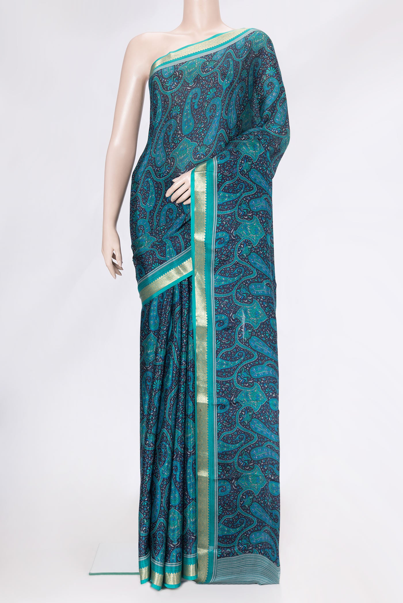 Navy Blue Dual Tone Crepe Saree with Printed design on the body and Zari Border.  displayed on a mannequin