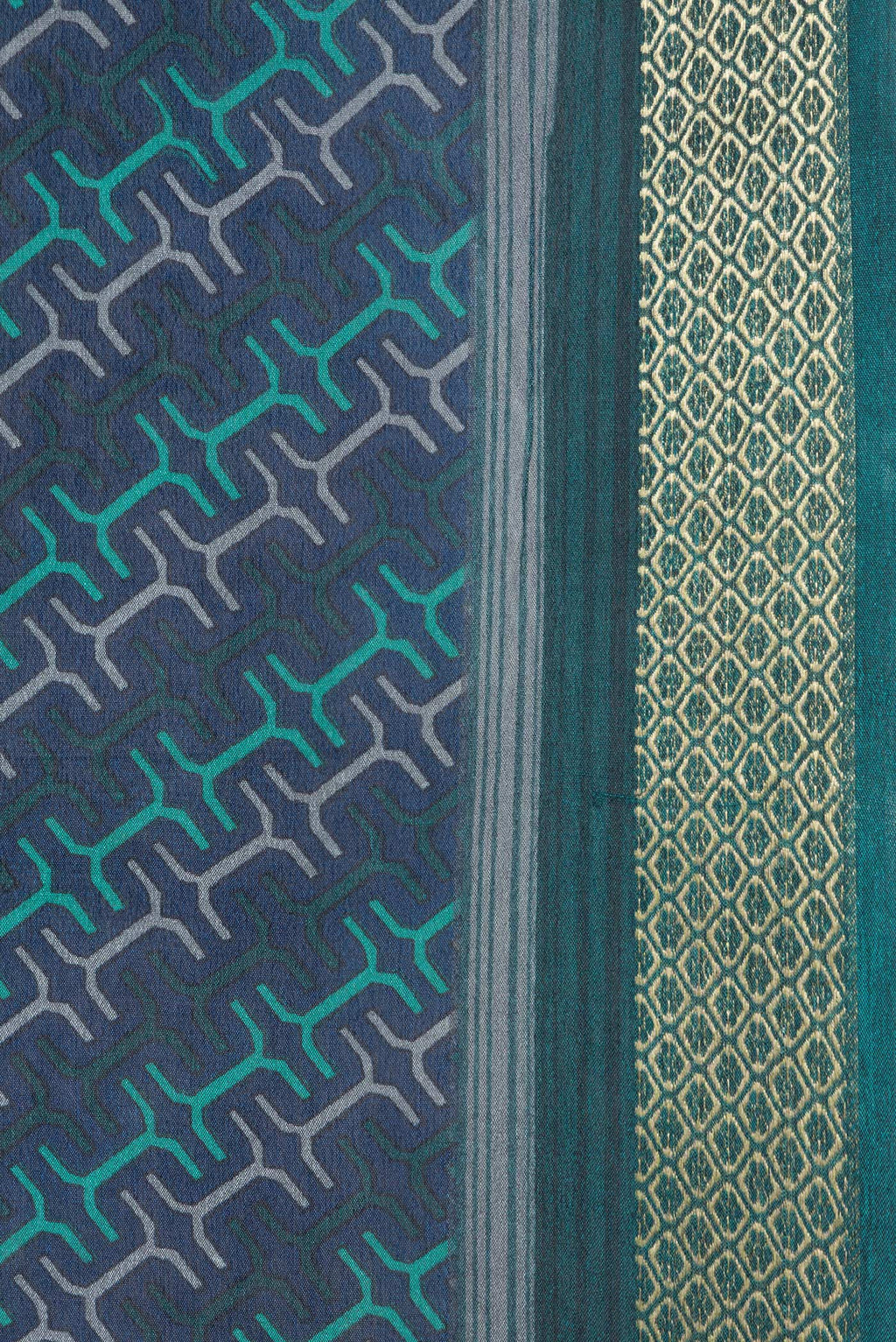 Border image of Peacock Blue Dual Tone Crepe Saree with Printed design on the body and Zari Border. 