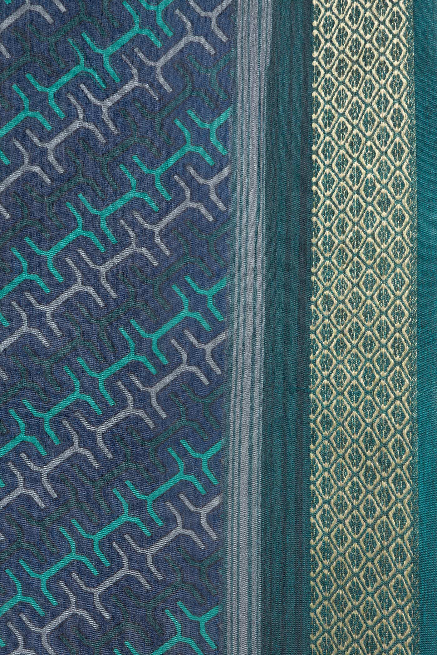 Border image of Peacock Blue Dual Tone Crepe Saree with Printed design on the body and Zari Border. 