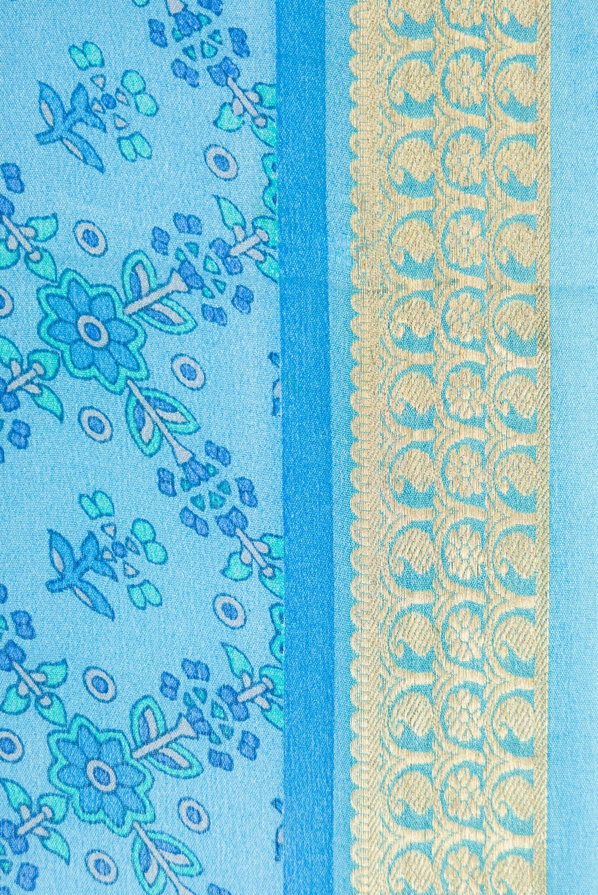 Border image of Sky Blue Dual Tone Mysore Crepe Saree with Printed design on the body and Zari Border. 