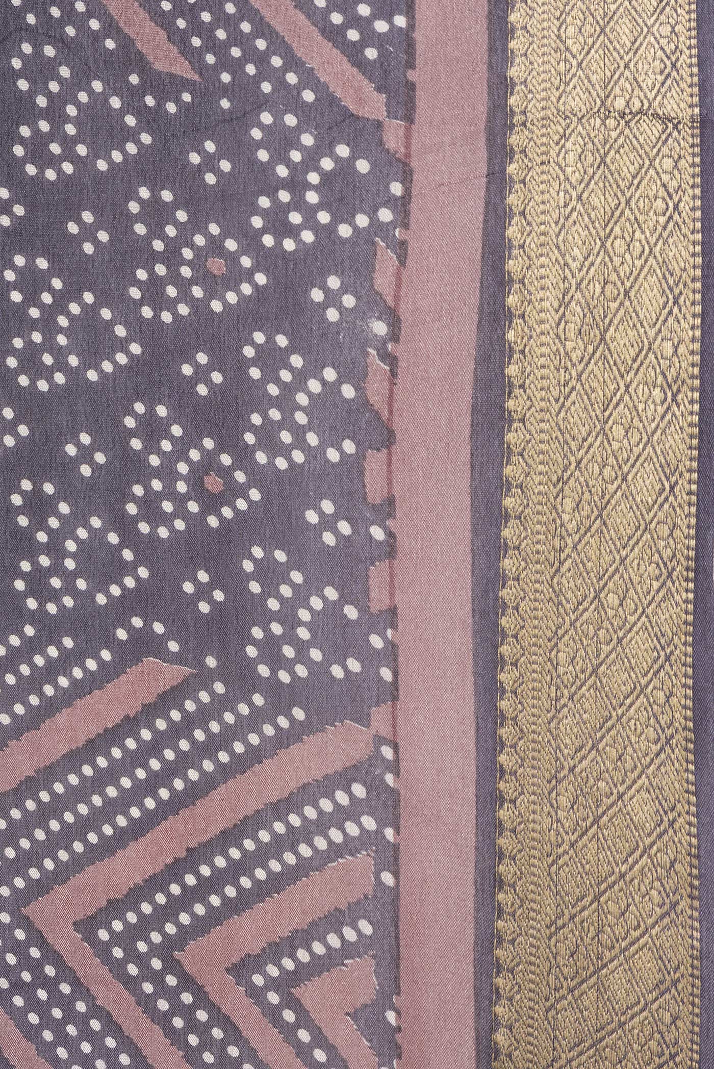 Border image of Brown Dual Tone Crepe Saree with Printed design on the body and Zari Border. 