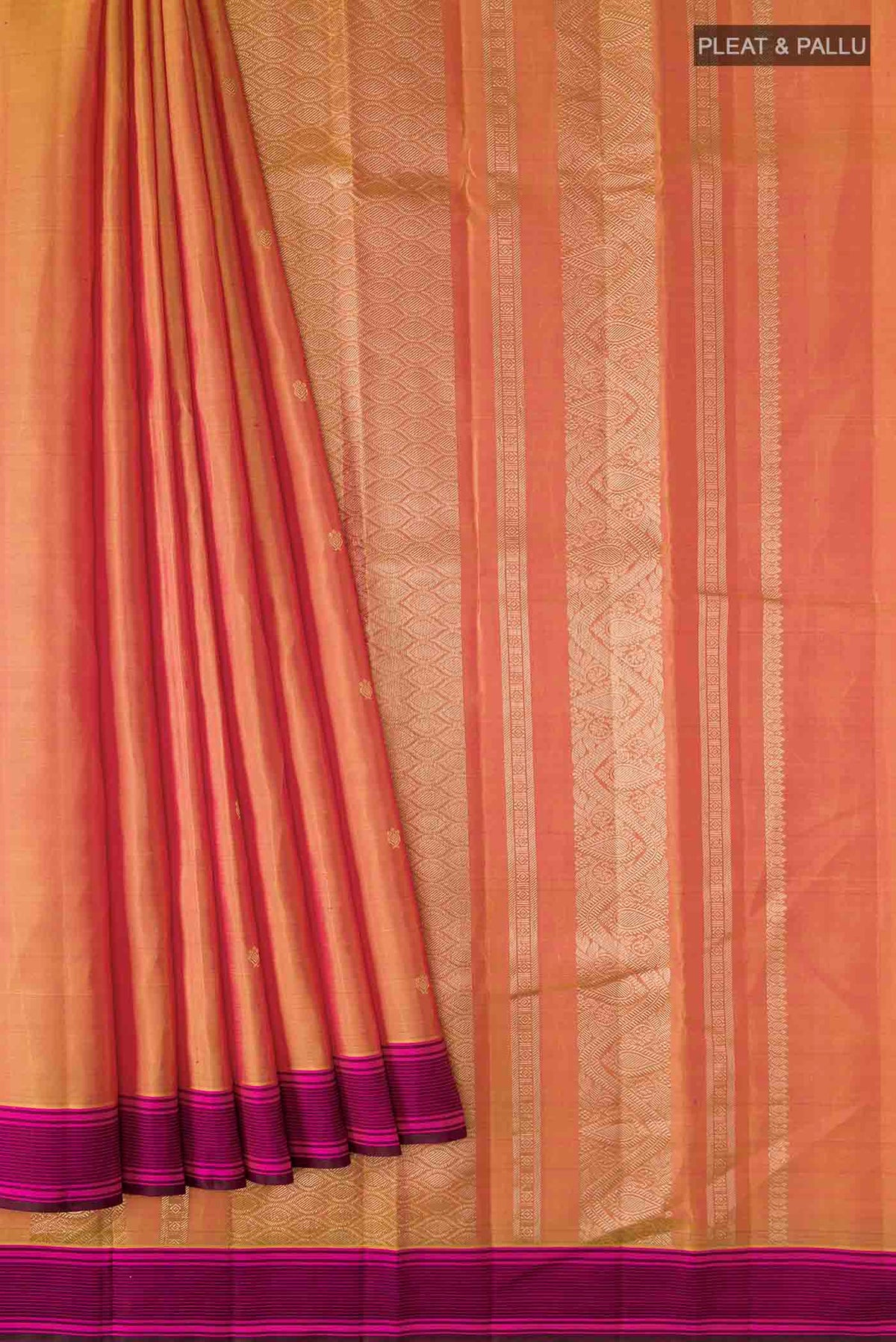 Pleats and pallu of Mustard Kanchipuram Silk Saree with Zari Butta on the body and Plain Border
