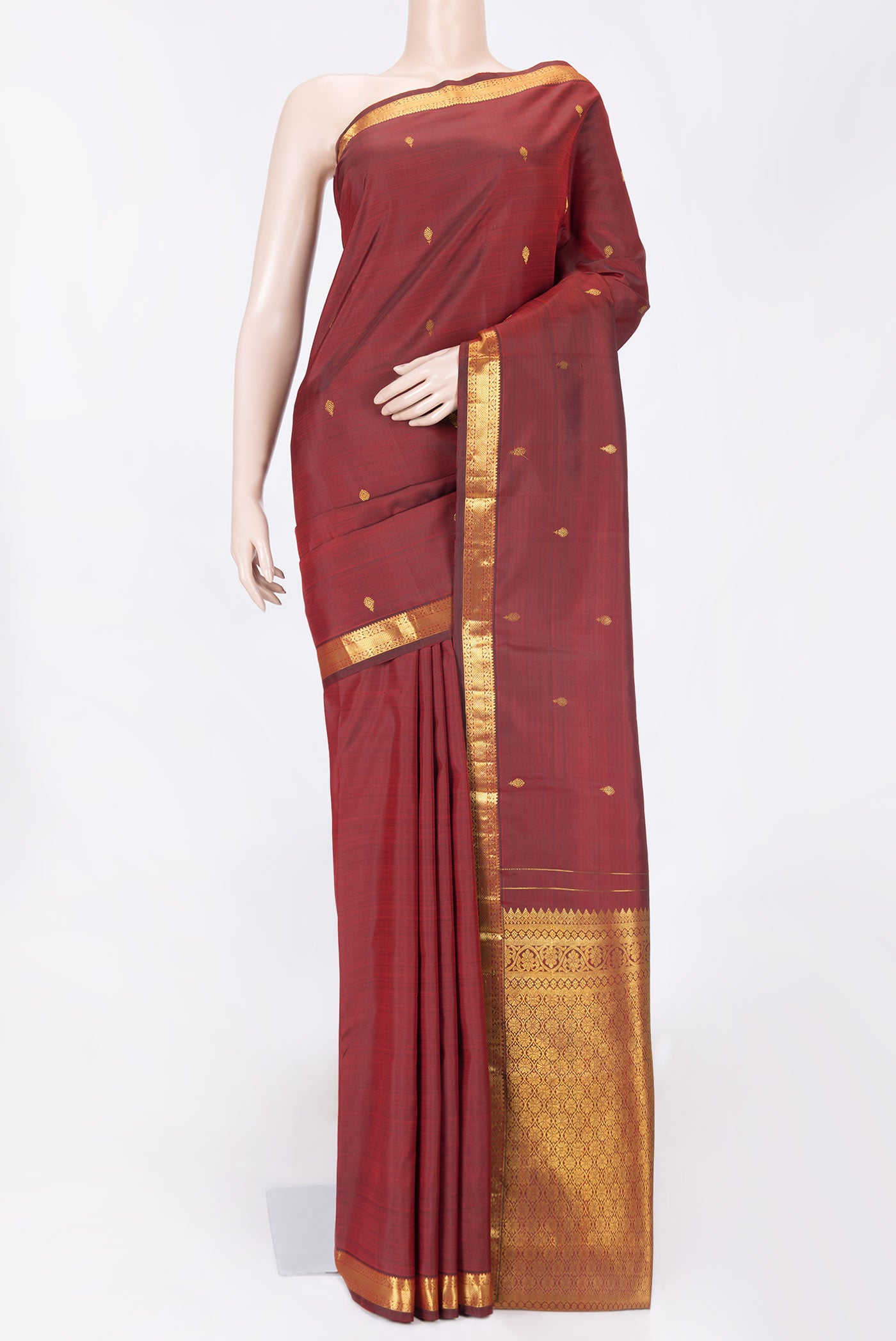 Maroon Dual Tone Kanchipuram Saree with Zari Butta on the body and Zari Border displayed on a mannequin