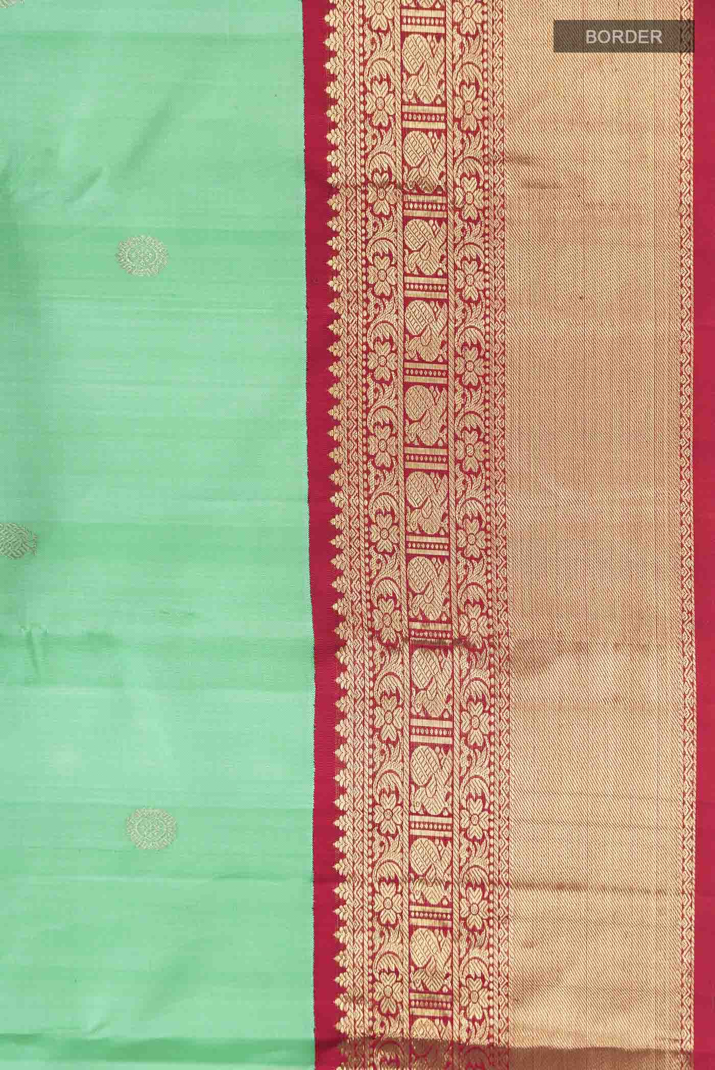 Border image of Green Kanchipuram Silk Saree with Zari Butta on the body and Zari Border