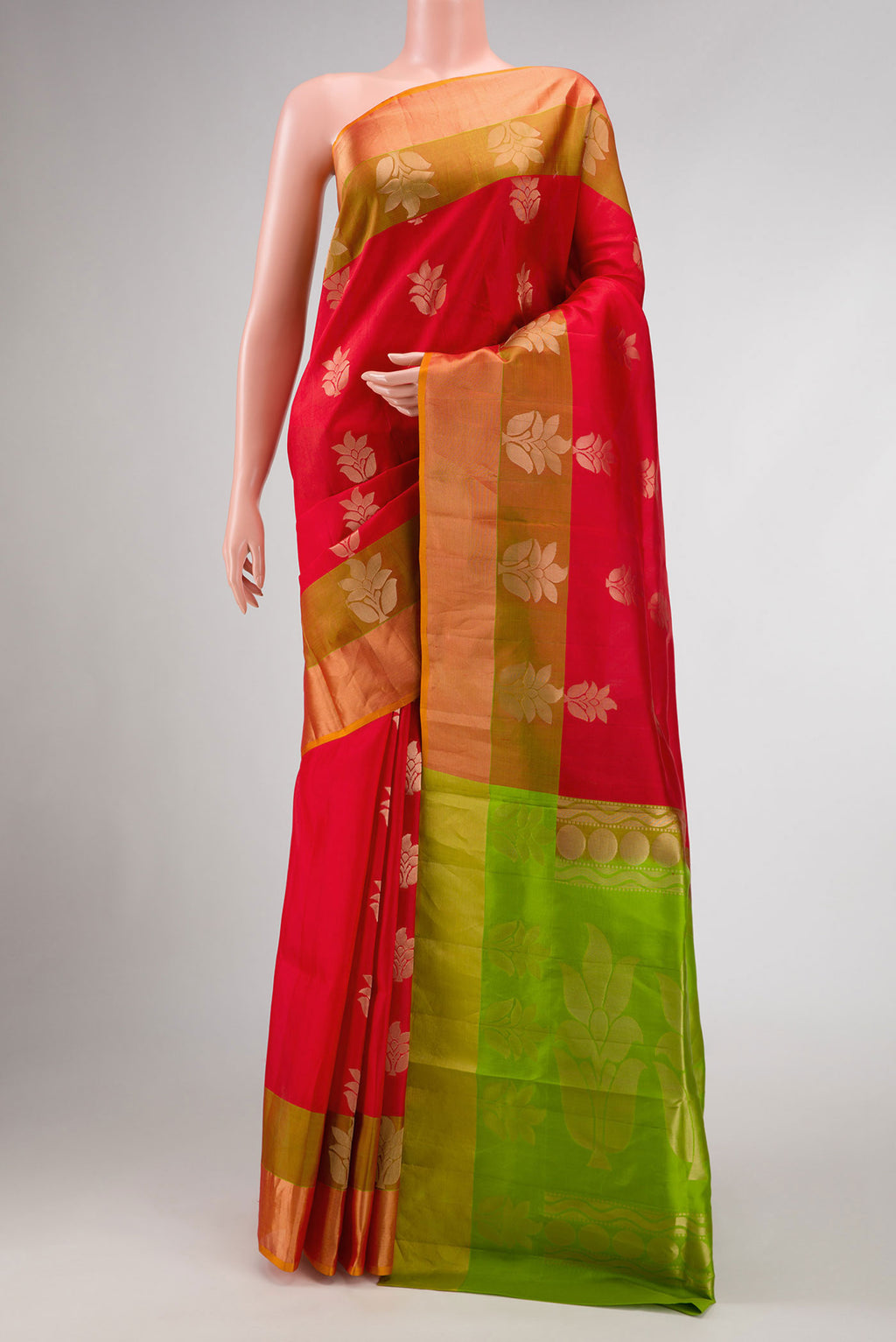 Red Dual Tone Soft Silk Saree with Zari Butta on the body and Zari Border.  displayed on a mannequin