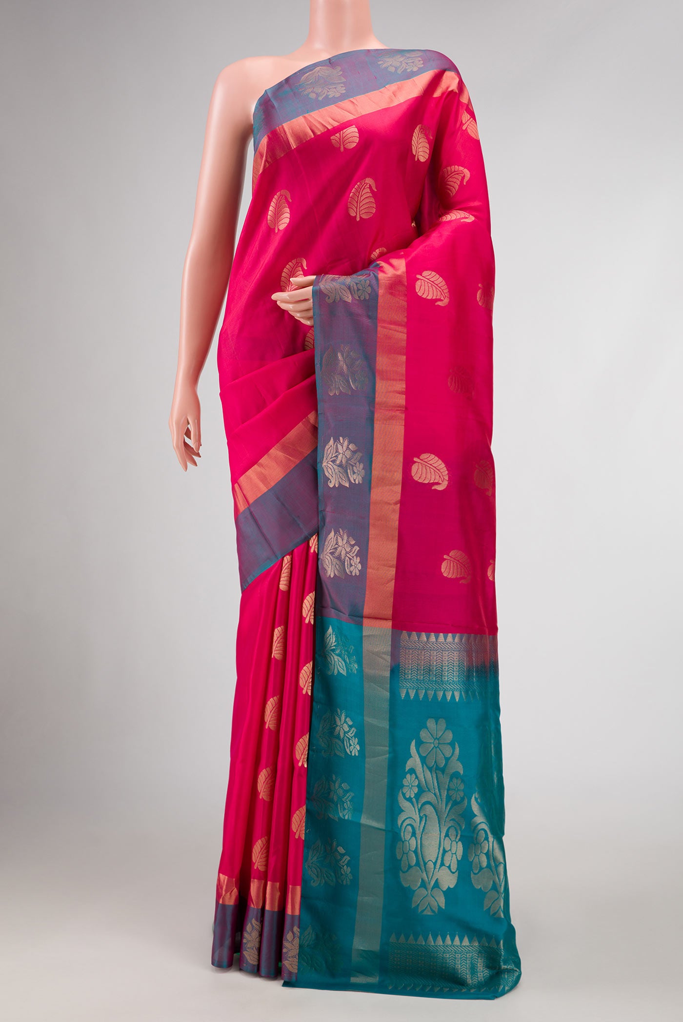 Pink Dual Tone Soft Silk Saree with Zari Butta on the body and Zari Border.  displayed on a mannequin