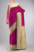 Pink Kanchipuram Silk Saree with Checked design on the body and Plain Border displayed on a mannequin