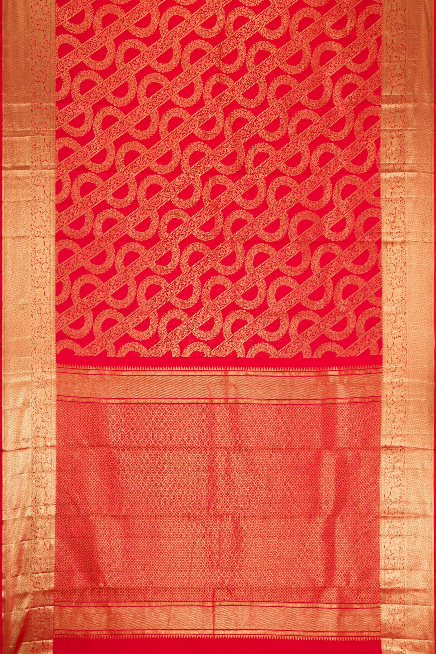 Flat view of Red Dual Tone Kanchipuram Silk Saree with Zari Brocade on the body and Zari Border. 