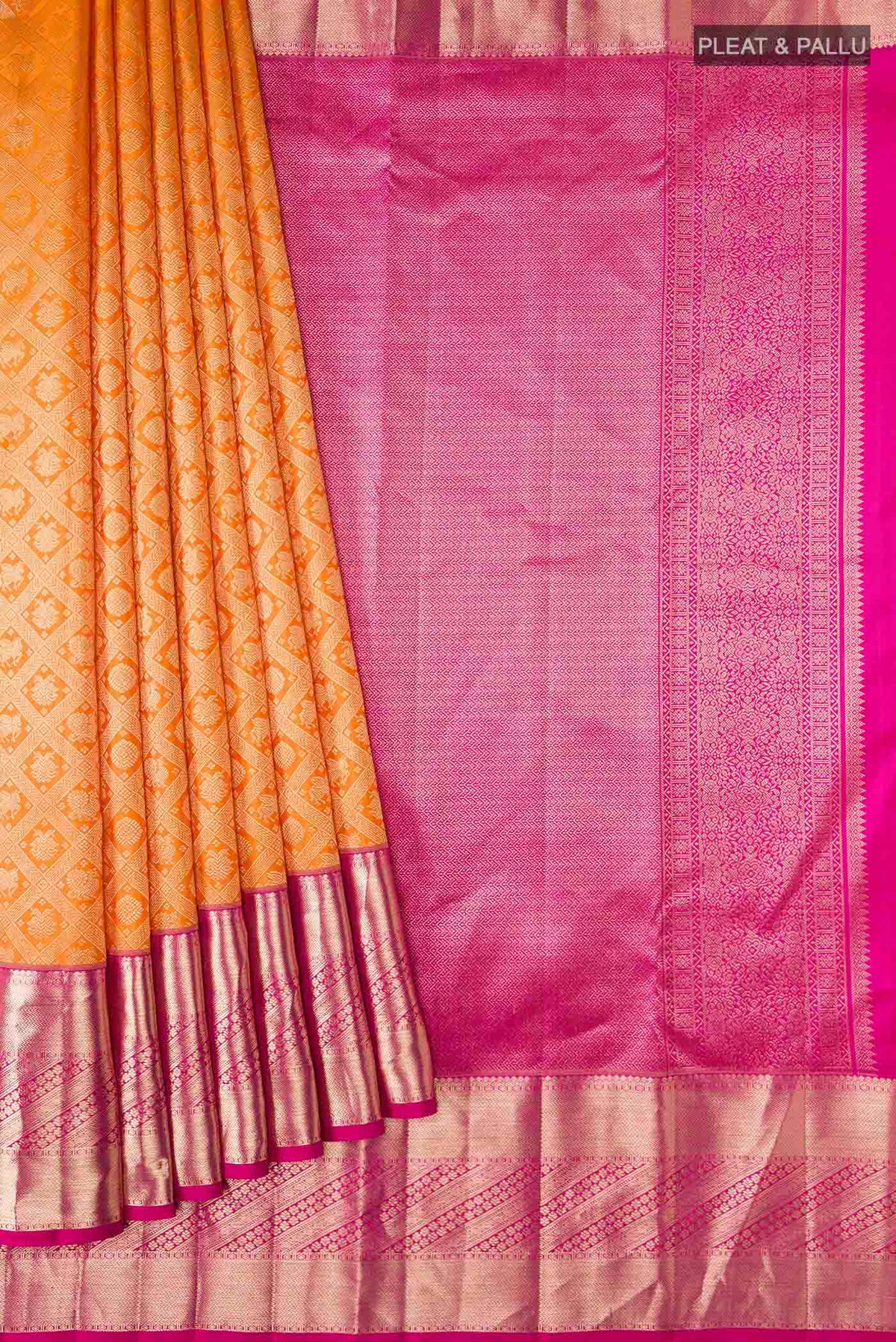 Pleats and pallu of Orange Kanchipuram Silk Saree with Zari Brocade on the body and Zari Border