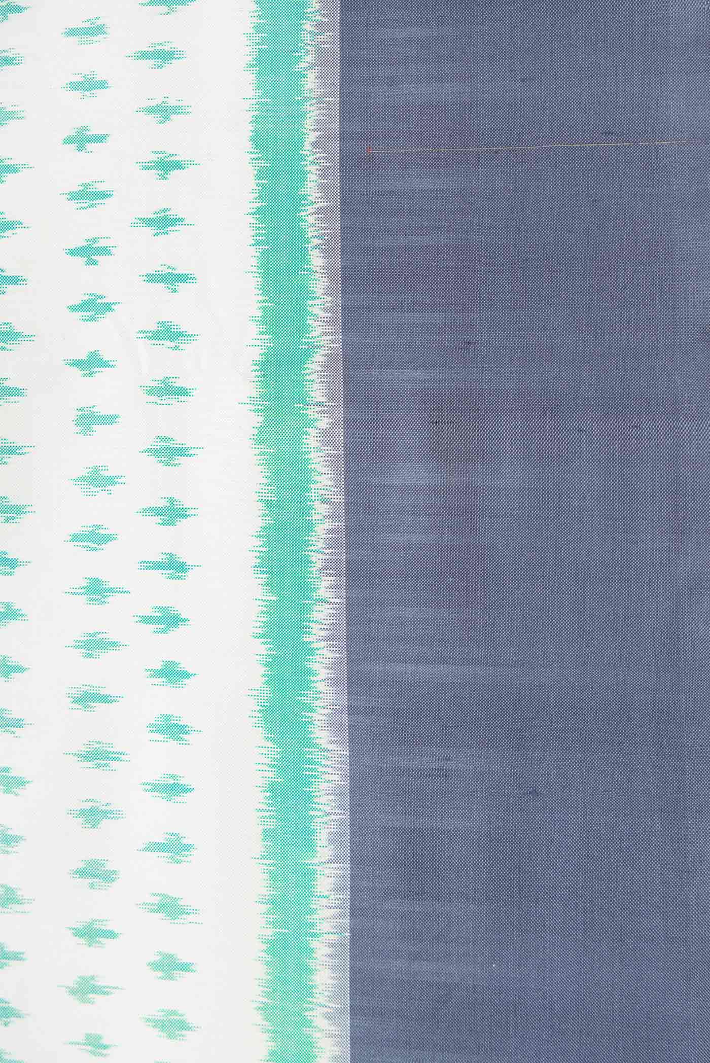 Border image of Off White Dual Tone Double Ikat Saree with Ikat Print on the body and Zari Border