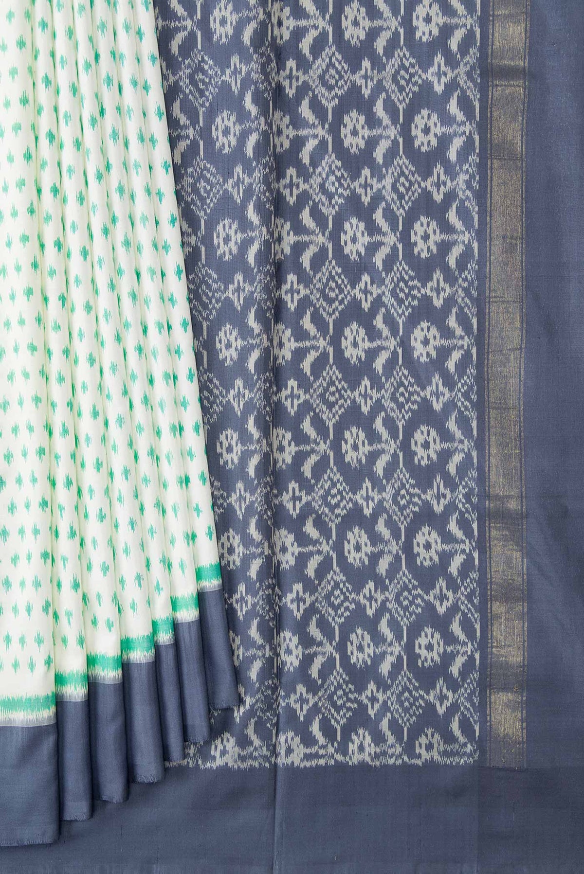 Pleats and pallu of Off White Dual Tone Double Ikat Saree with Ikat Print on the body and Zari Border