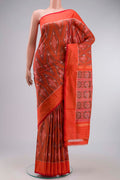 Orange Pochampally Silk Saree with Pure Ikat on the body and Plain Border displayed on a mannequin