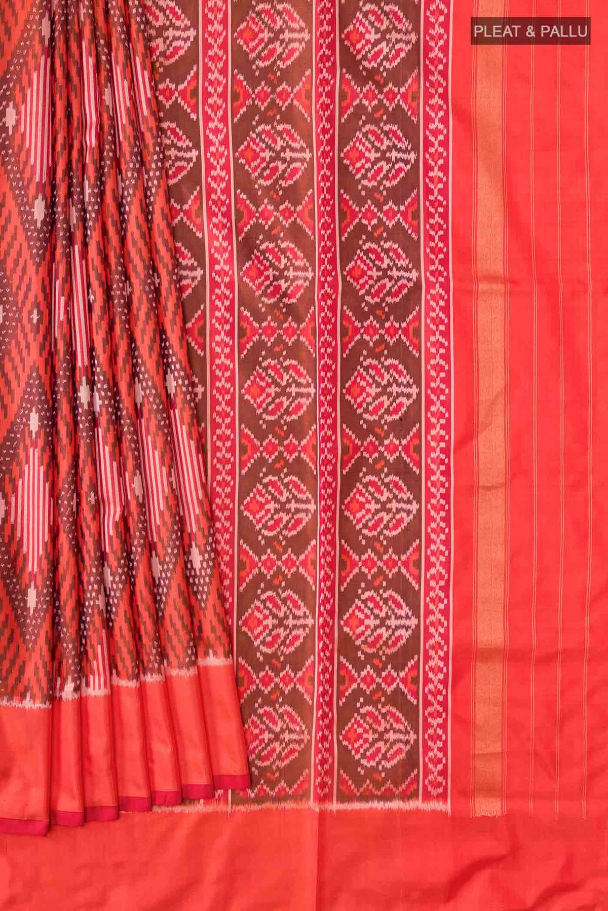 Pleats and pallu of Orange Pochampally Silk Saree with Pure Ikat on the body and Plain Border