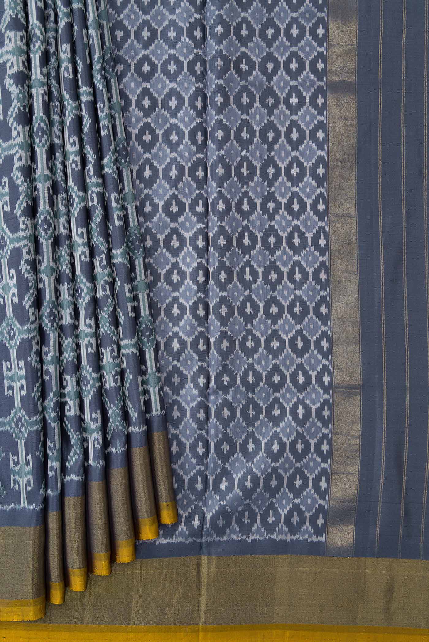 Pleats and pallu of Grey Dual Tone Double Ikat Saree with Ikat Print on the body and Zari Border