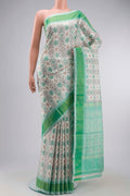 White Pochampally Silk Saree with Pure Ikat on the body and Zari Border displayed on a mannequin