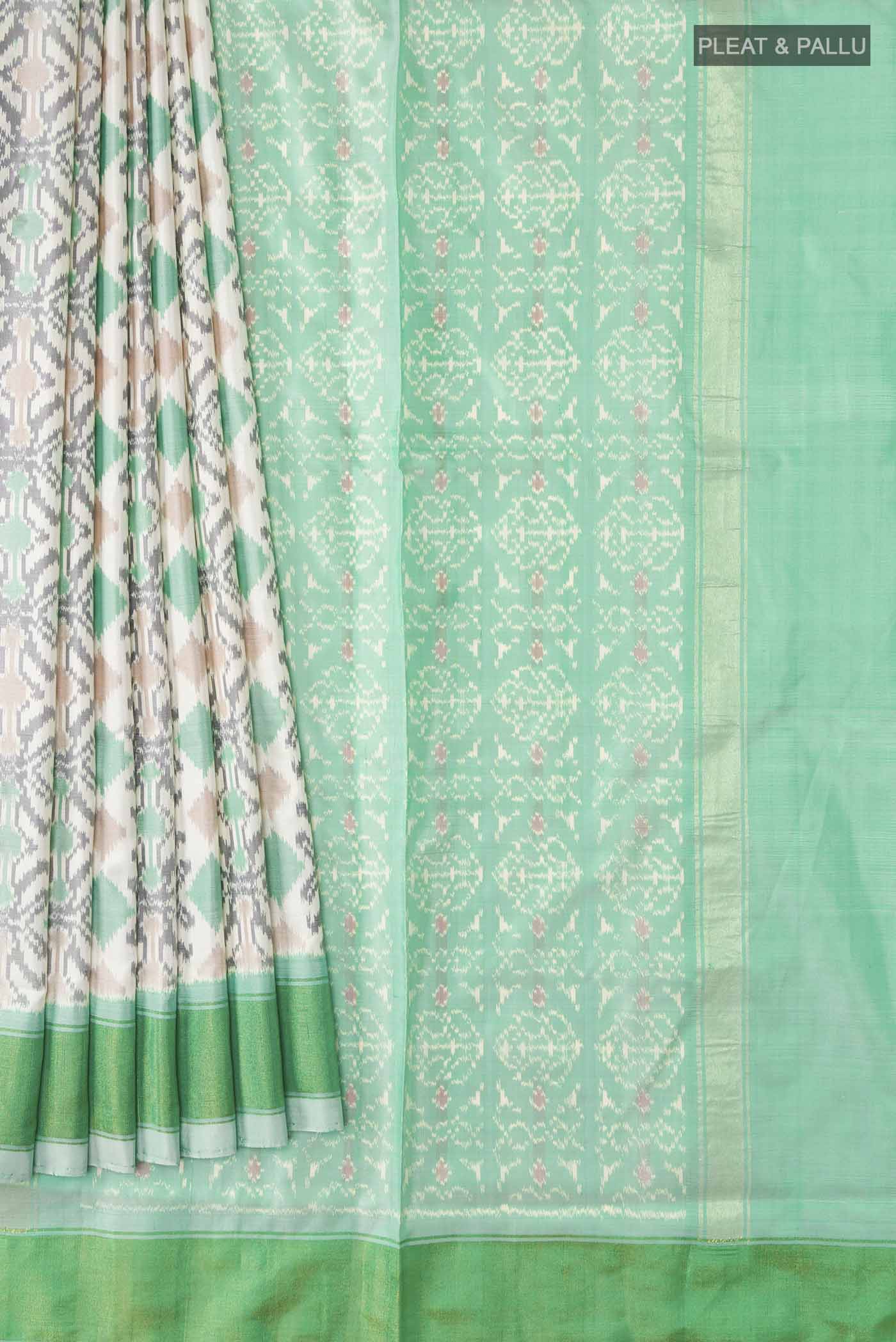 Pleats and pallu of White Pochampally Silk Saree with Pure Ikat on the body and Zari Border