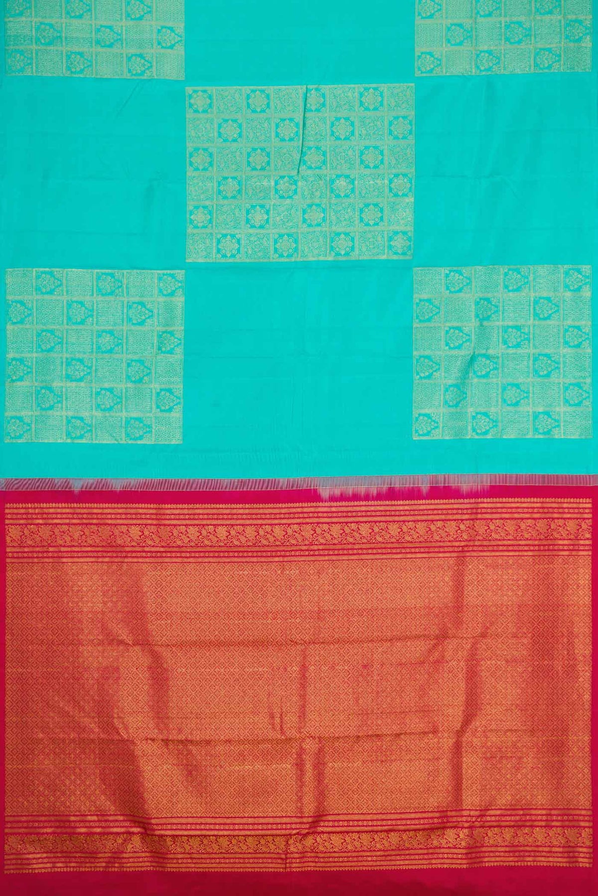 Flat view of Sky Blue Dual Tone Kanchipuram Silk Saree with Zari Butta on the body and Without Border