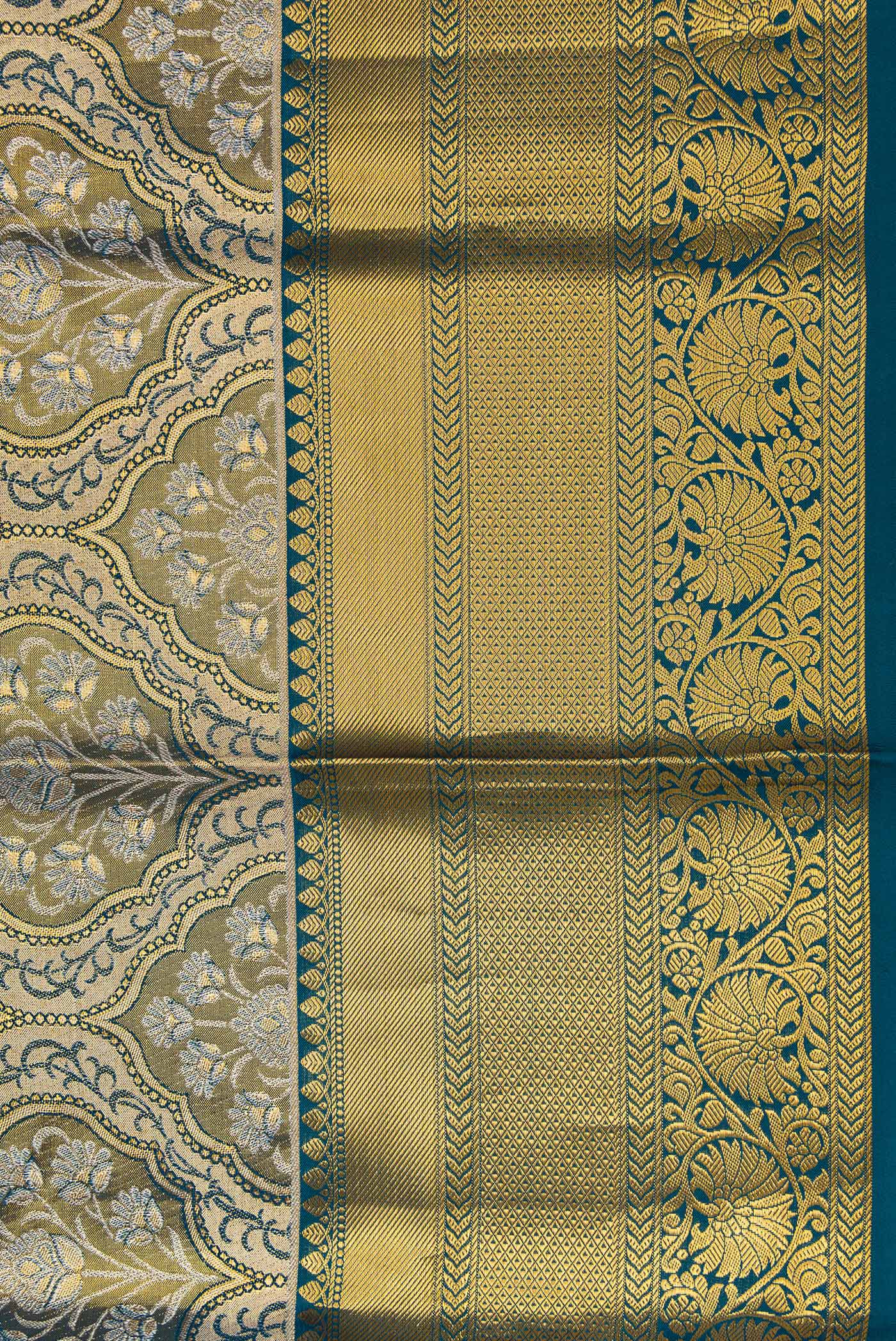 Border image of Mehandi Green Dual Tone Kanchipuram Tissue Silk Saree with Zari Brocade on the body and Zari Border. 