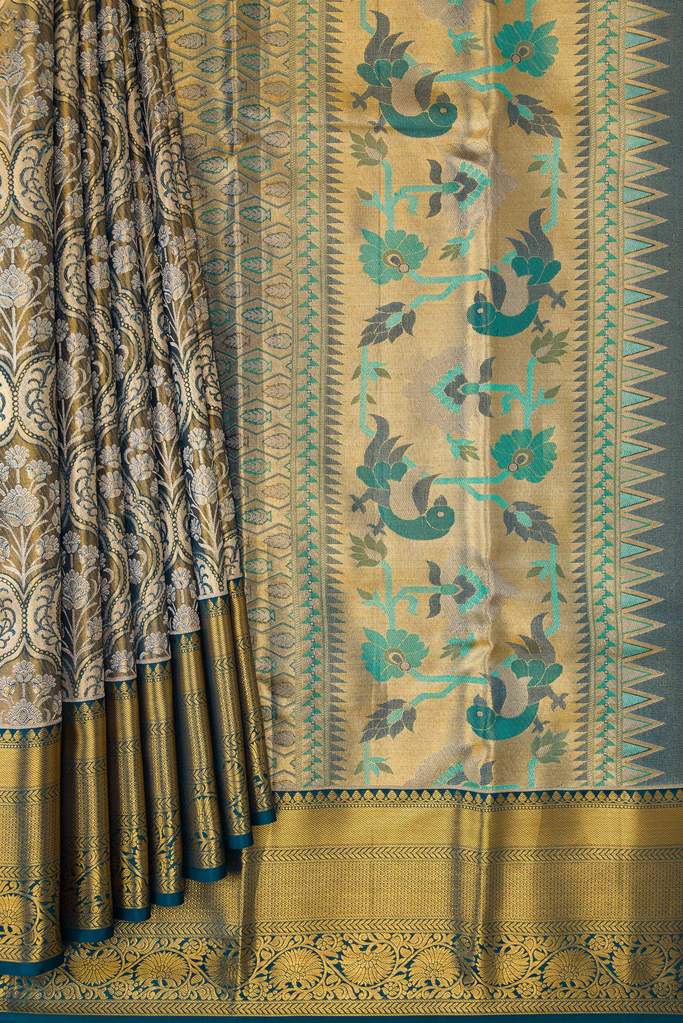 Pleats and pallu of Mehandi Green Dual Tone Kanchipuram Tissue Silk Saree with Zari Brocade on the body and Zari Border. 