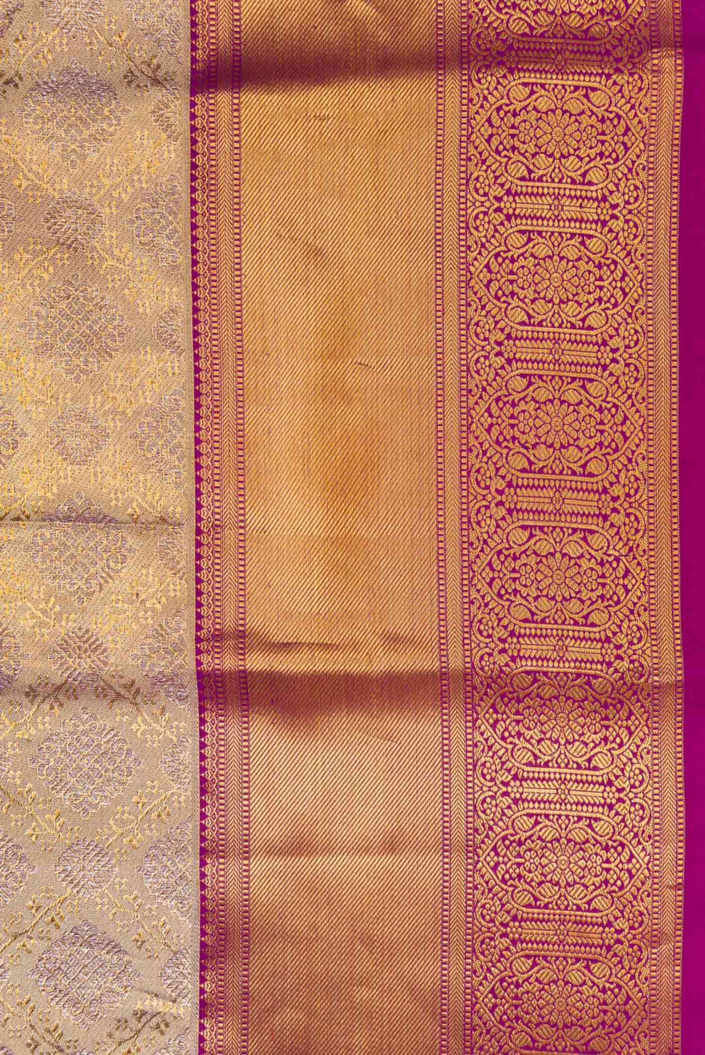 Border image of Gold Dual Tone Kanchipuram Tissue Silk Saree with Zari Brocade on the body and Zari Border. 