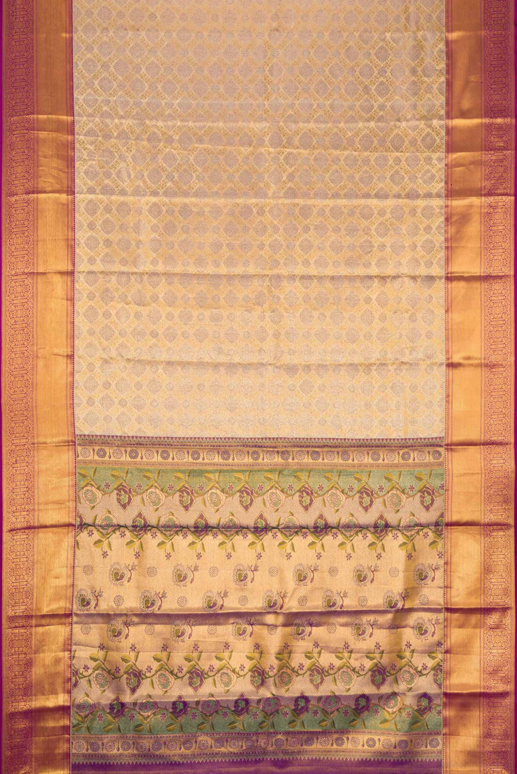 Flat view of Gold Dual Tone Kanchipuram Tissue Silk Saree with Zari Brocade on the body and Zari Border. 