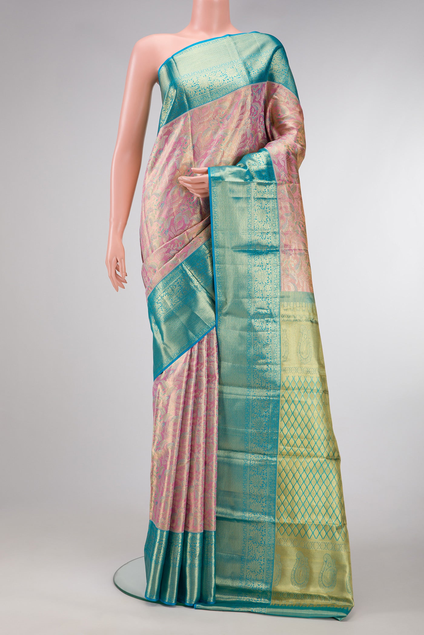 Pink Dual Tone Kanchipuram Tissue Silk Saree with Zari Brocade on the body and Zari Border.  displayed on a mannequin